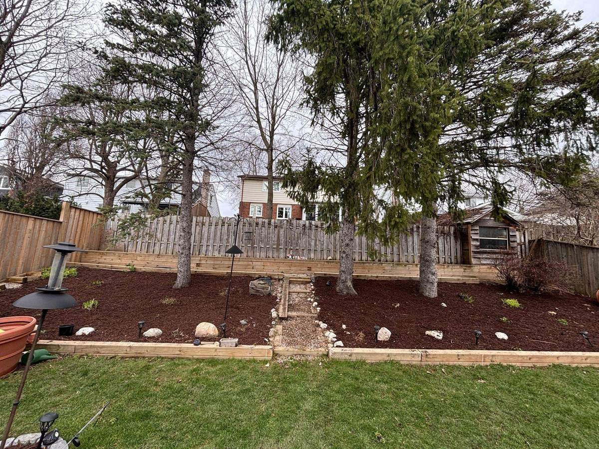 Backyard tidied during a fall cleanup in Guelph